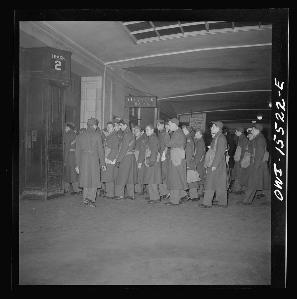Chicago, Illinois. Soldier in the Union Station going back to camp after a weekend furlough in Chicago. Sourced from the…