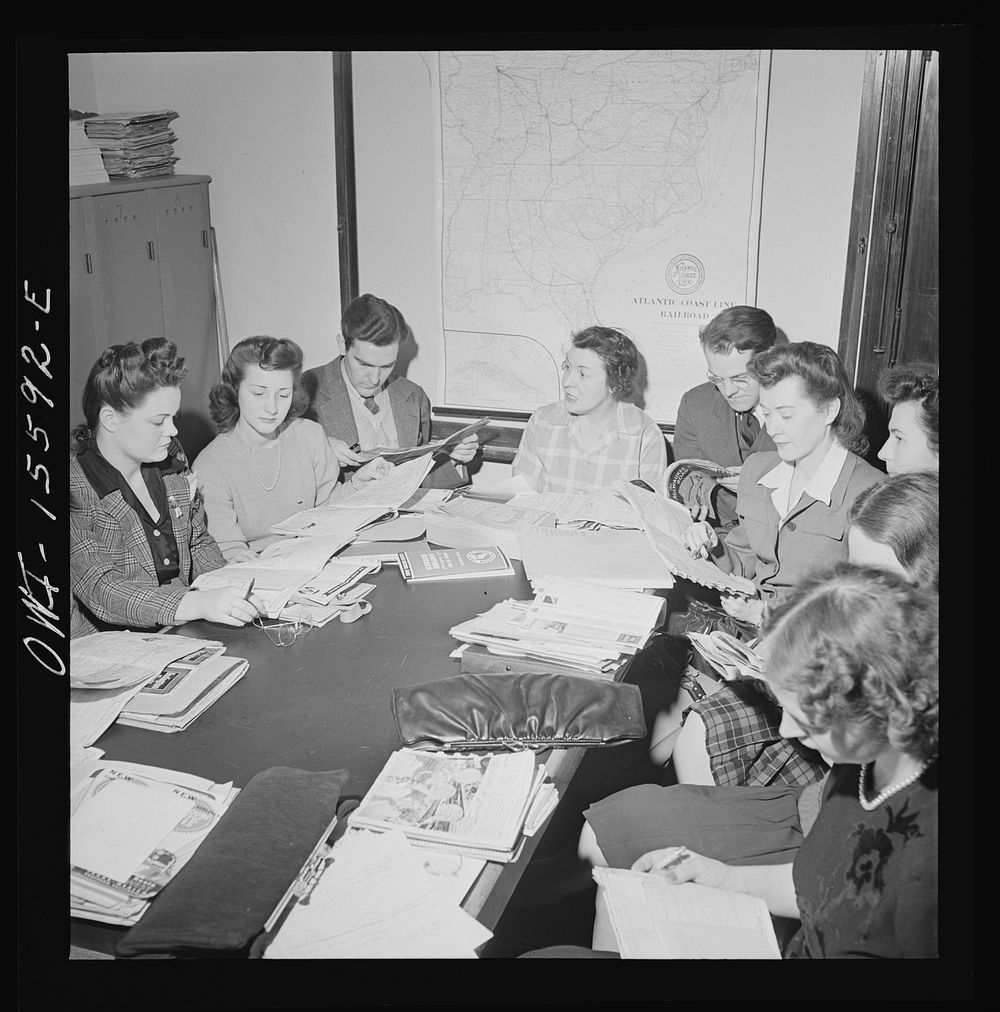 Chicago, Illinois. Evening information supervisor conducting a class in railroad information at the Union Station. Sourced…