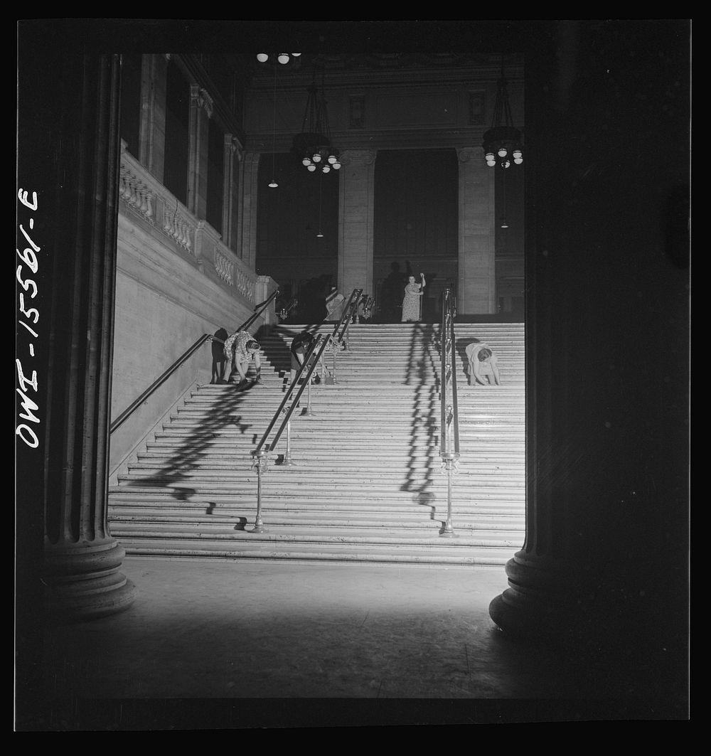 Chicago, Illinois. Scrubwoman at work in the Union Station after midnight. Sourced from the Library of Congress.