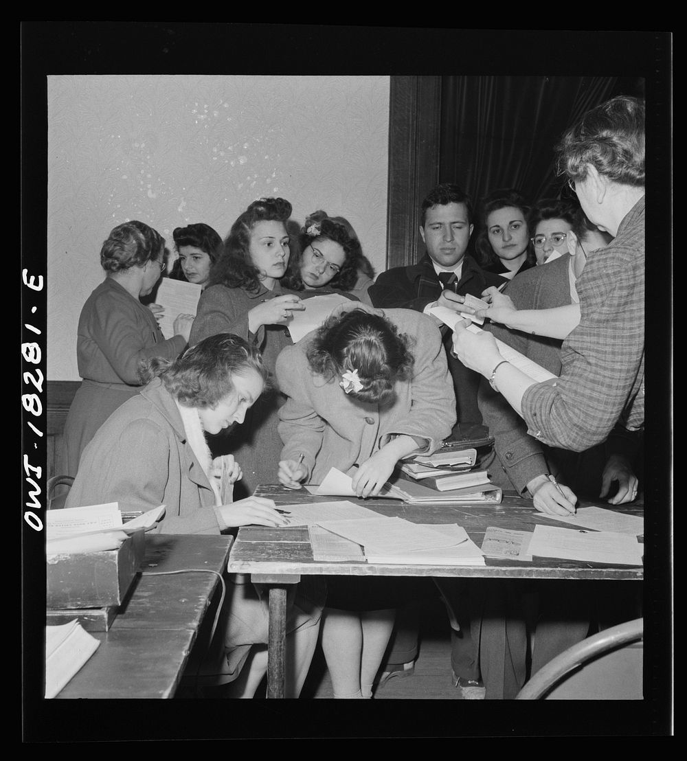 Madison, Wisconsin. Farm short course school at the University of Wisconsin. Students registering for ration book number…