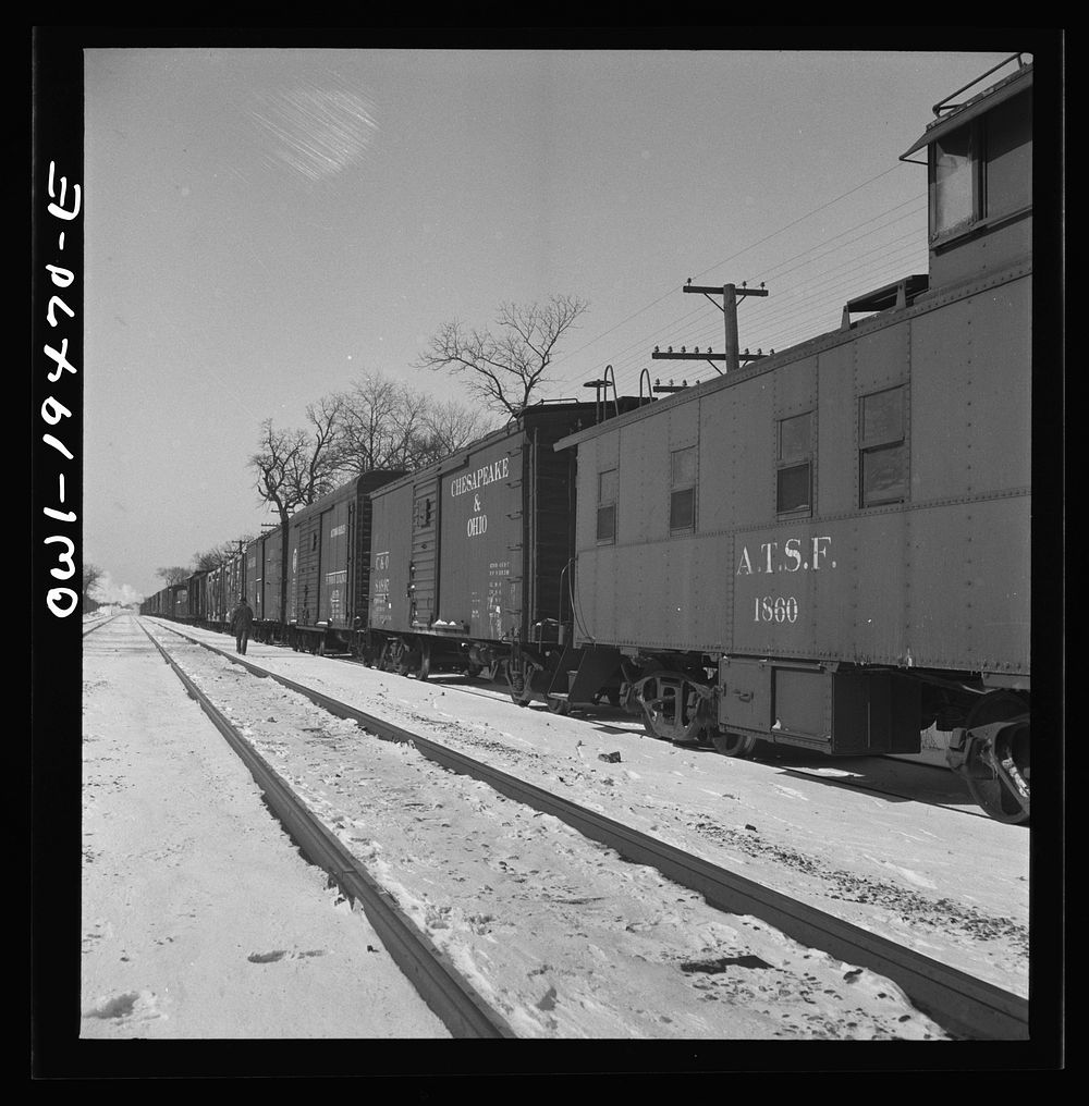 Willow Springs, Illinois. Waiting in a siding for a passenger train to pass on the Atchison, Topeka, and Santa Fe Railroad…