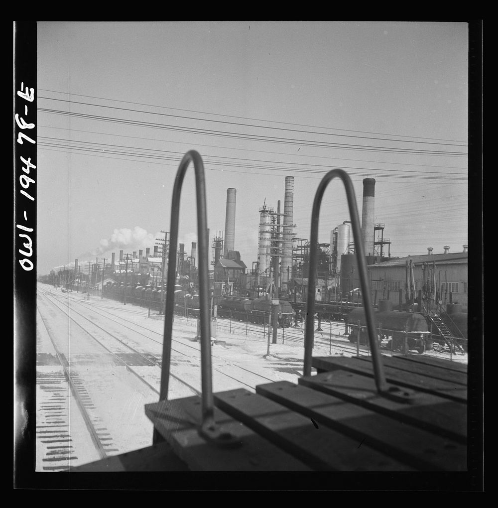 Lockport, Illinois. Passing the refinery of the Texas Oil Company along the Atchison, Topeka, and Santa Fe Railroad between…