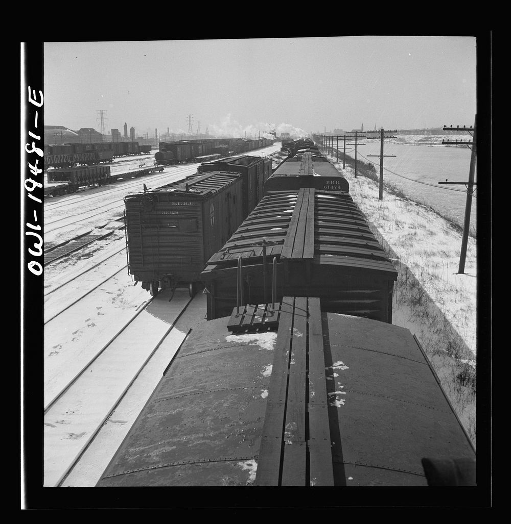 [Untitled photo, possibly related to: Joliet, Illinois. Stopping for coal, water and inspection along the Atchison, Topeka…