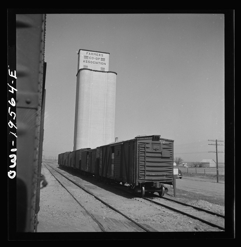 Capron, Oklahoma. A grain elevator along the Atchison, Topeka, and Santa Fe Railroad between Wellington, Kansas and Waynoka…