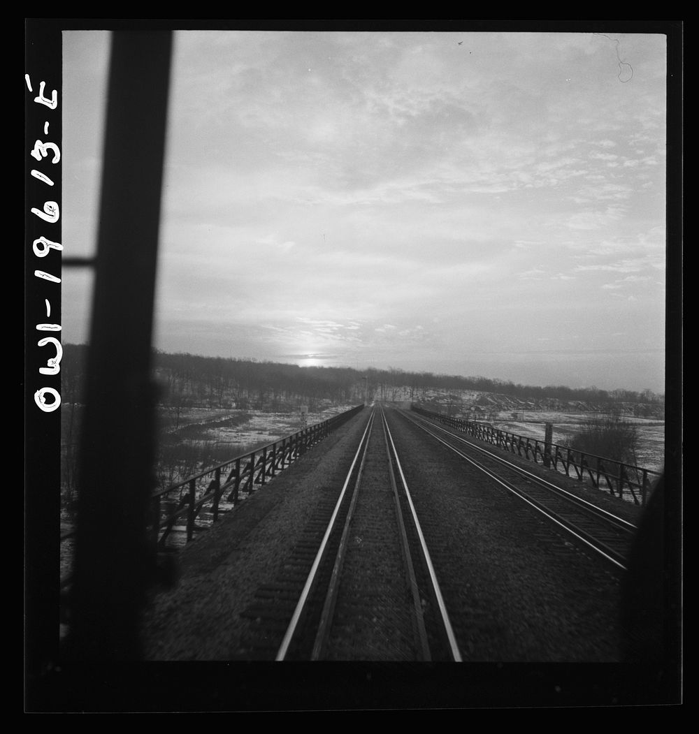 Fort Madison, Iowa. Leaving the Atchison, Topeka, and Santa Fe Railroad yard early in the morning. Sourced from the Library…