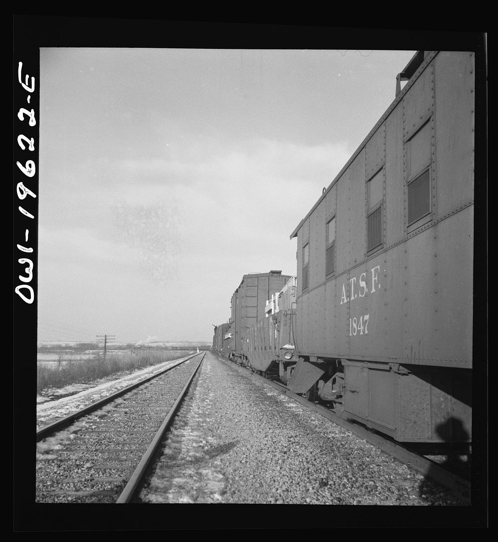 [Untitled photo, possibly related to: Baring, Missouri. A train stopping for coal and water along the Atchison, Topeka, and…