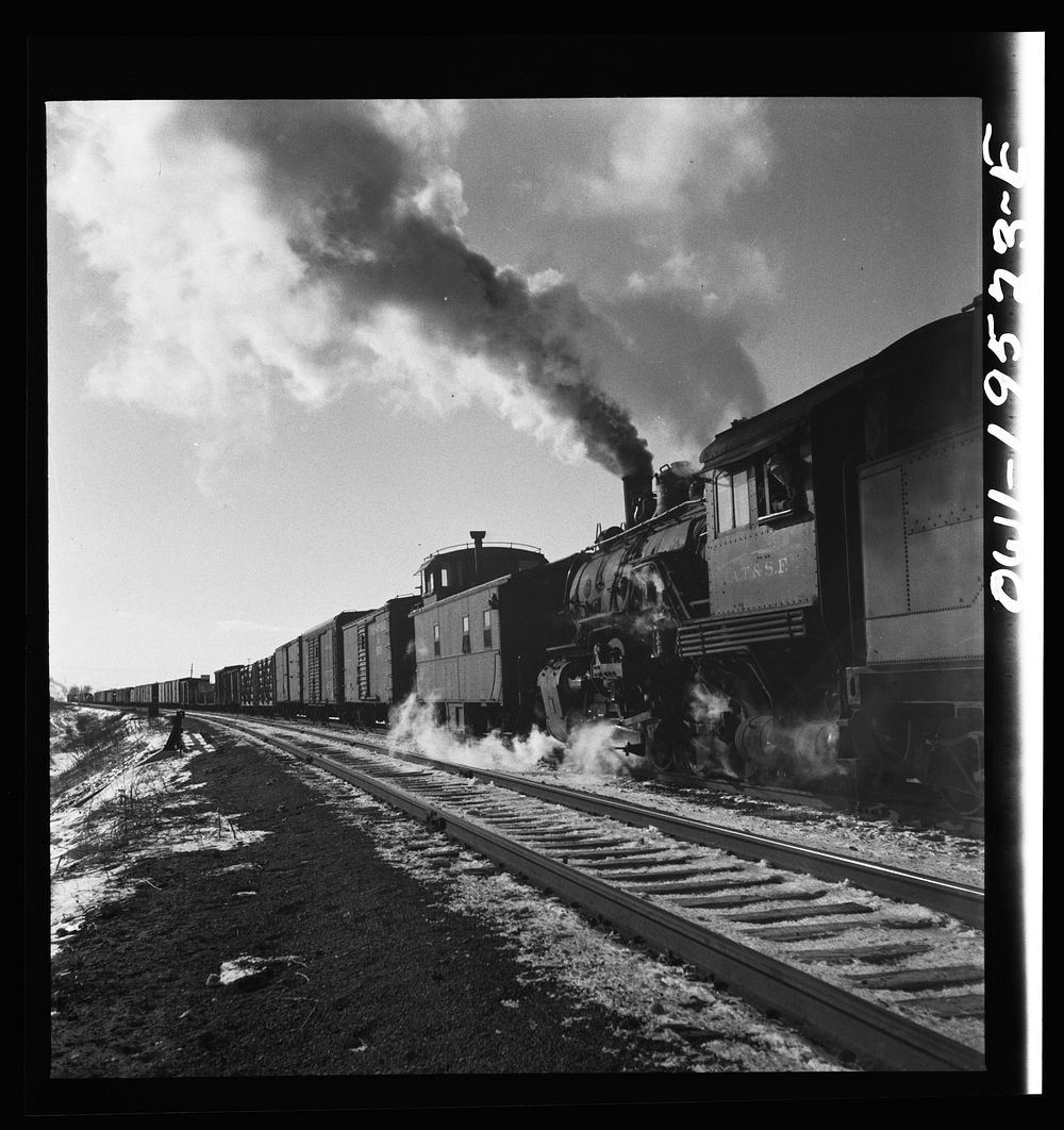 [Untitled photo, possibly related to: Chillicothe, Illinois. Changing crews and cabooses of a westbound freight train along…