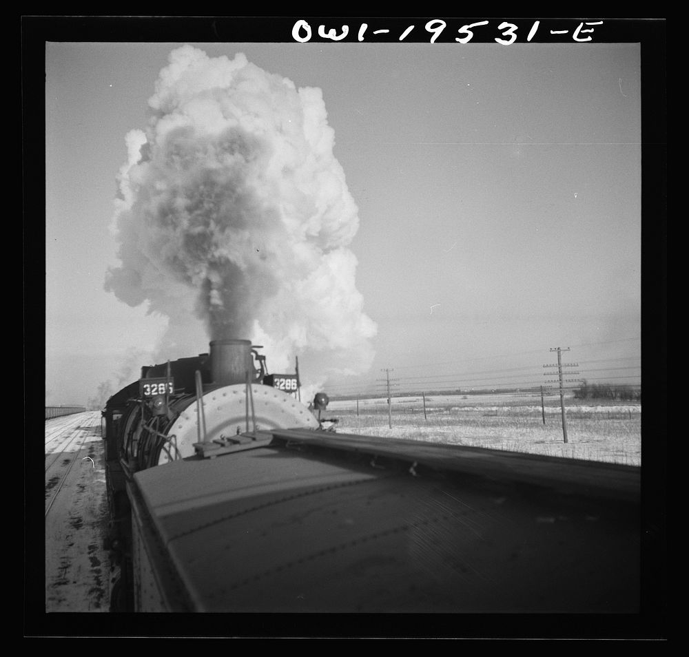[Untitled photo, possibly related to: Chillicothe, Illinois. A helper engine is taken on for added power on a grade…