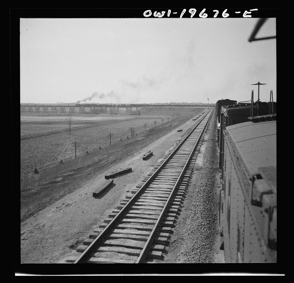 [Untitled photo, possibly related to: Sibley, Missouri. A freight train on the Atchison, Topeka, and Santa Fe Railroad…