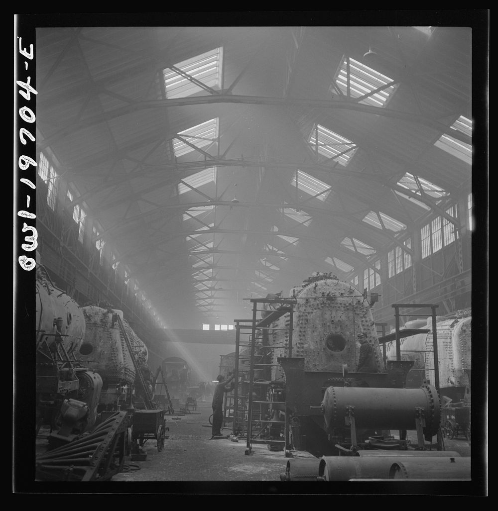 Topeka, Kansas. A general view of a part of the locomotive shops of the Atchison, Topeka, and Santa Fe Railroad. Sourced…