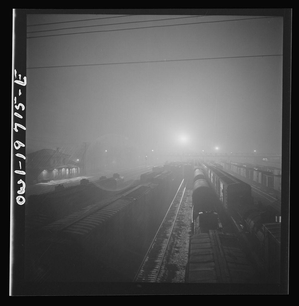 [Untitled photo, possibly related to: Argentine, Kansas. Night view of the Atchison, Topeka, and Santa Fe Railroad shops and…