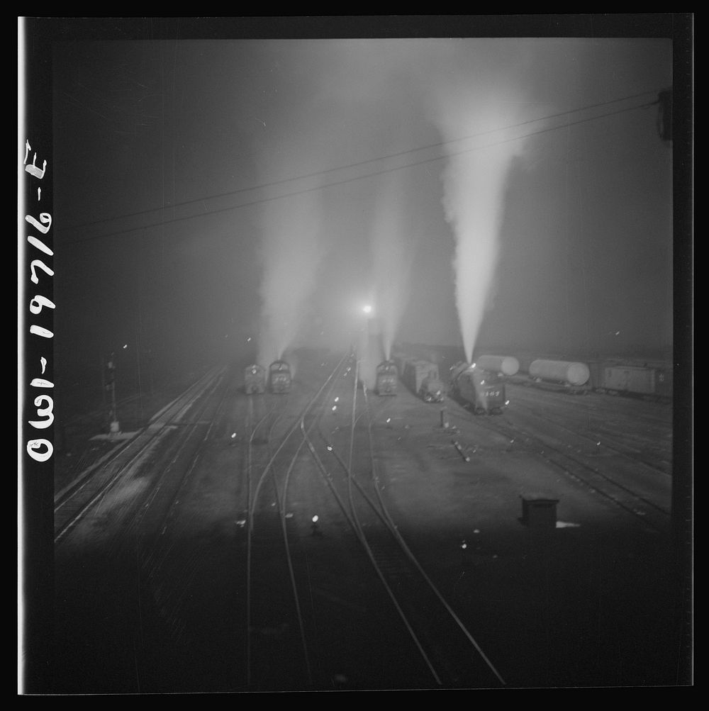[Untitled photo, possibly related to: Argentine, Kansas. Night view of the Atchison, Topeka, and Santa Fe Railroad shops and…