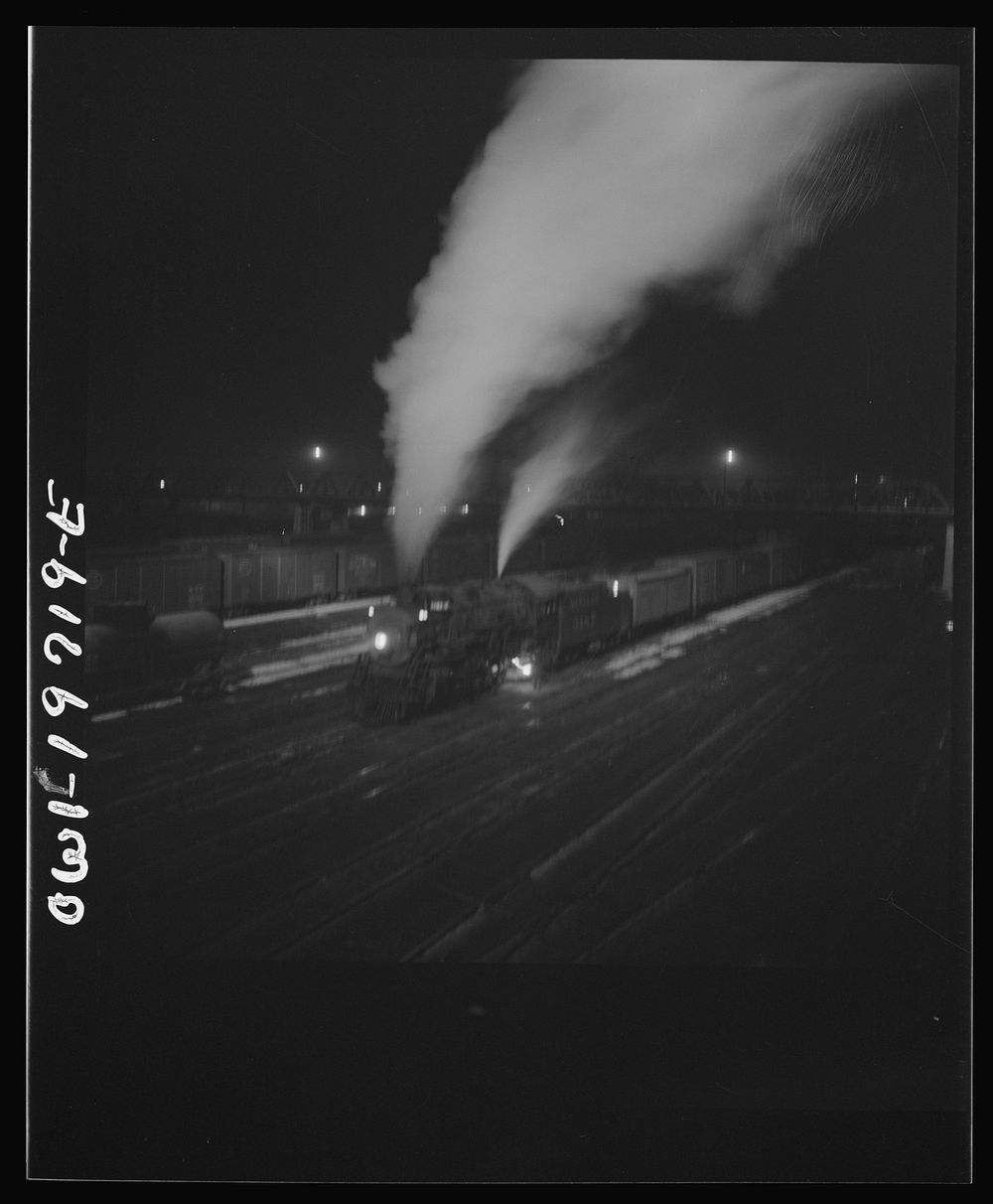 [Untitled photo, possibly related to: Argentine, Kansas. Freight train about to leave the Atchison, Topeka, and Santa Fe…