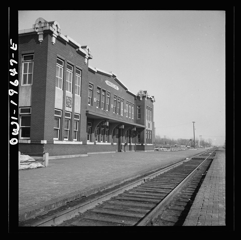 Marceline, Missouri. The Atchison, Topeka, and Santa Fe Railroad depot and office building. Sourced from the Library of…