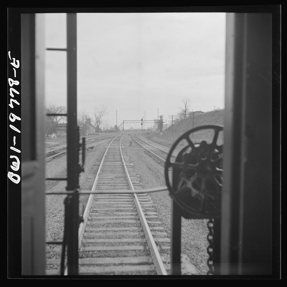 [Untitled photo, possibly related to: Argentine, Kansas. Atchison, Topeka, and Santa Fe Railroad train pulling out of the…