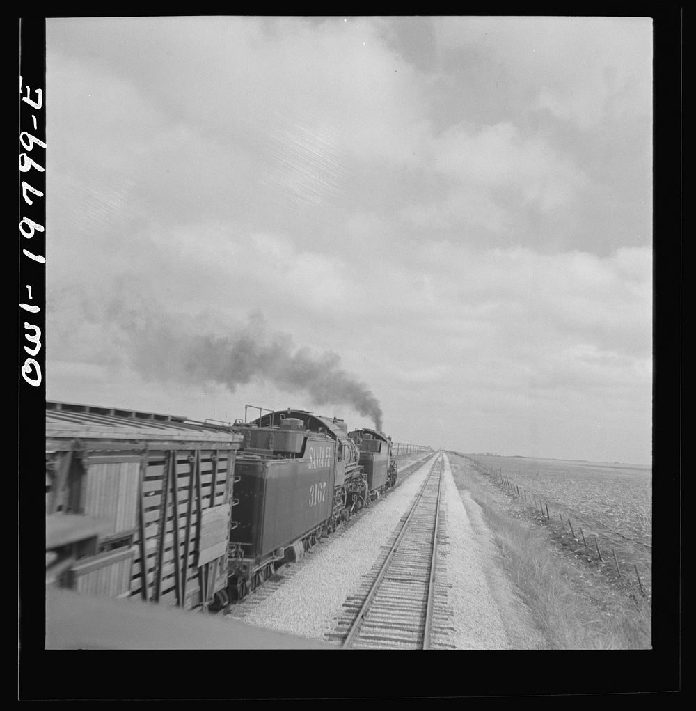 Emporia, Kansas. An Atchison, Topeka, and Santa Fe train between Argentine and Emporia, Kansas passing an eastbound freight…