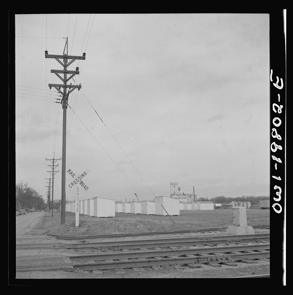 [Untitled photo, possibly related to: Emporia (vicinity), Kansas. Crossing farm land along the Atchison, Topeka, and Santa…