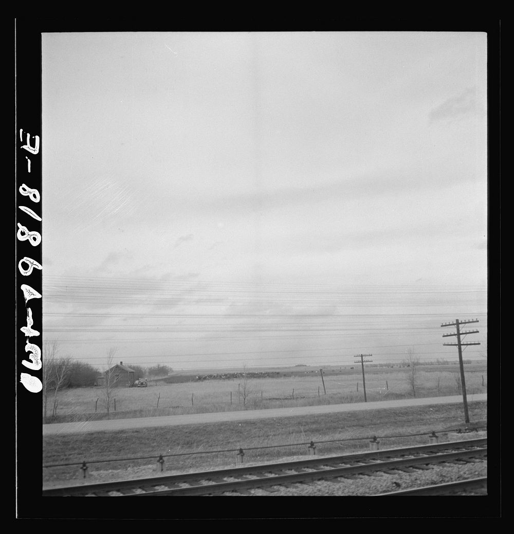[Untitled photo, possibly related to: An Atchison, Topeka, and Santa Fe passenger train passing through the Flint Hills…