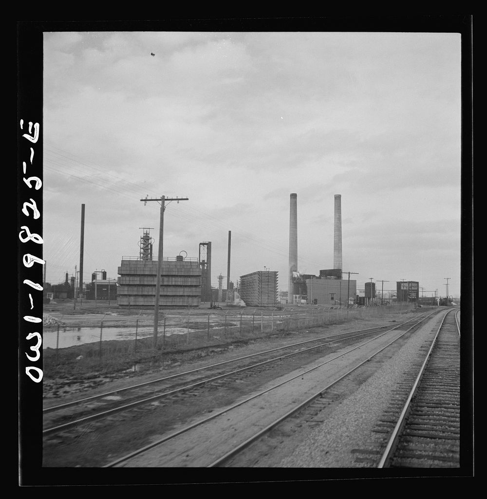 Wellington, Kansas. Passing an oil refinery on the Atchison, Topeka, and Santa Fe Railroad between Emporia and Wellington…
