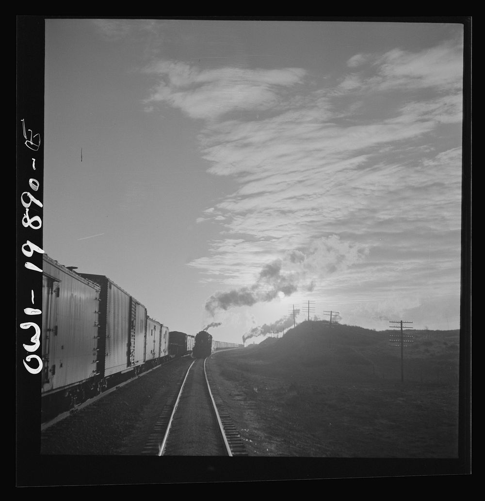[Untitled photo, possibly related to: Belva, Oklahoma. Helper engine coming to help push the train on the Atchison, Topeka…