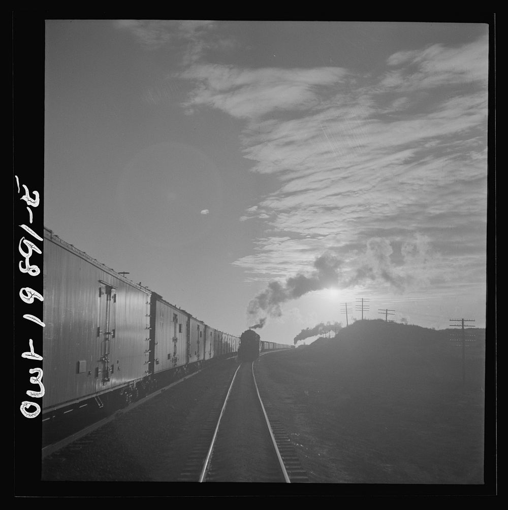 [Untitled photo, possibly related to: Curtis, Oklahoma. Helper engine leaving the train on Atchison, Topeka, and Santa Fe…