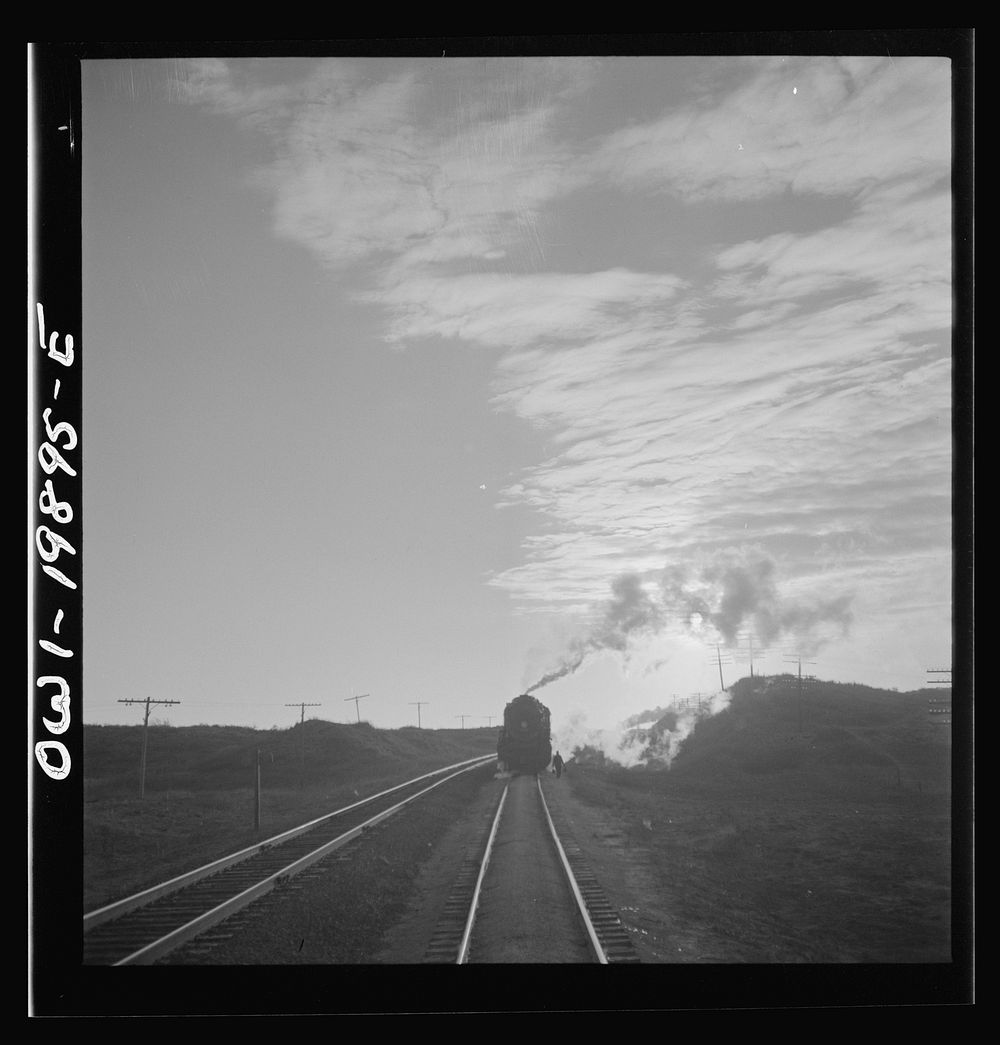 [Untitled photo, possibly related to: Curtis, Oklahoma. Helper engine leaving the train on Atchison, Topeka, and Santa Fe…