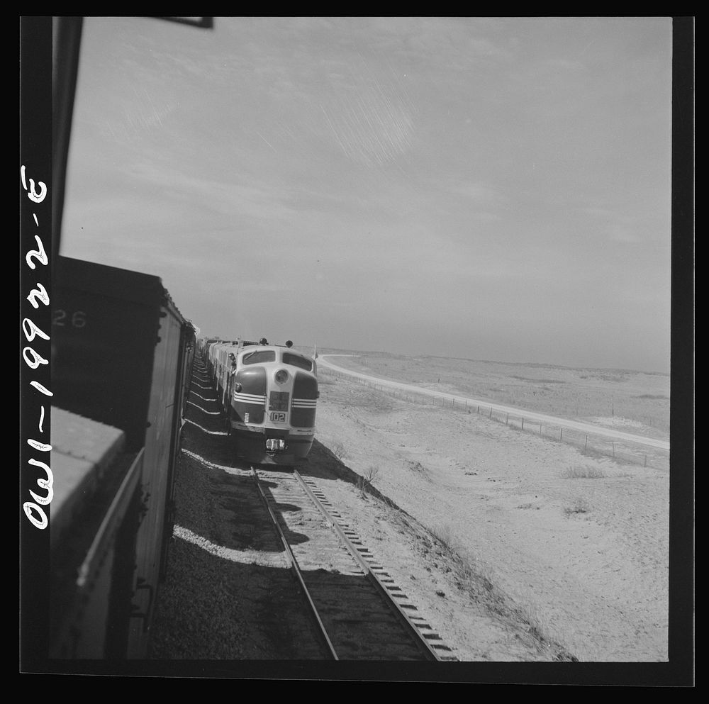 [Untitled photo, possibly related to: Higgins, Texas. Going across flat lands along the Atchison, Topeka and Santa Fe…