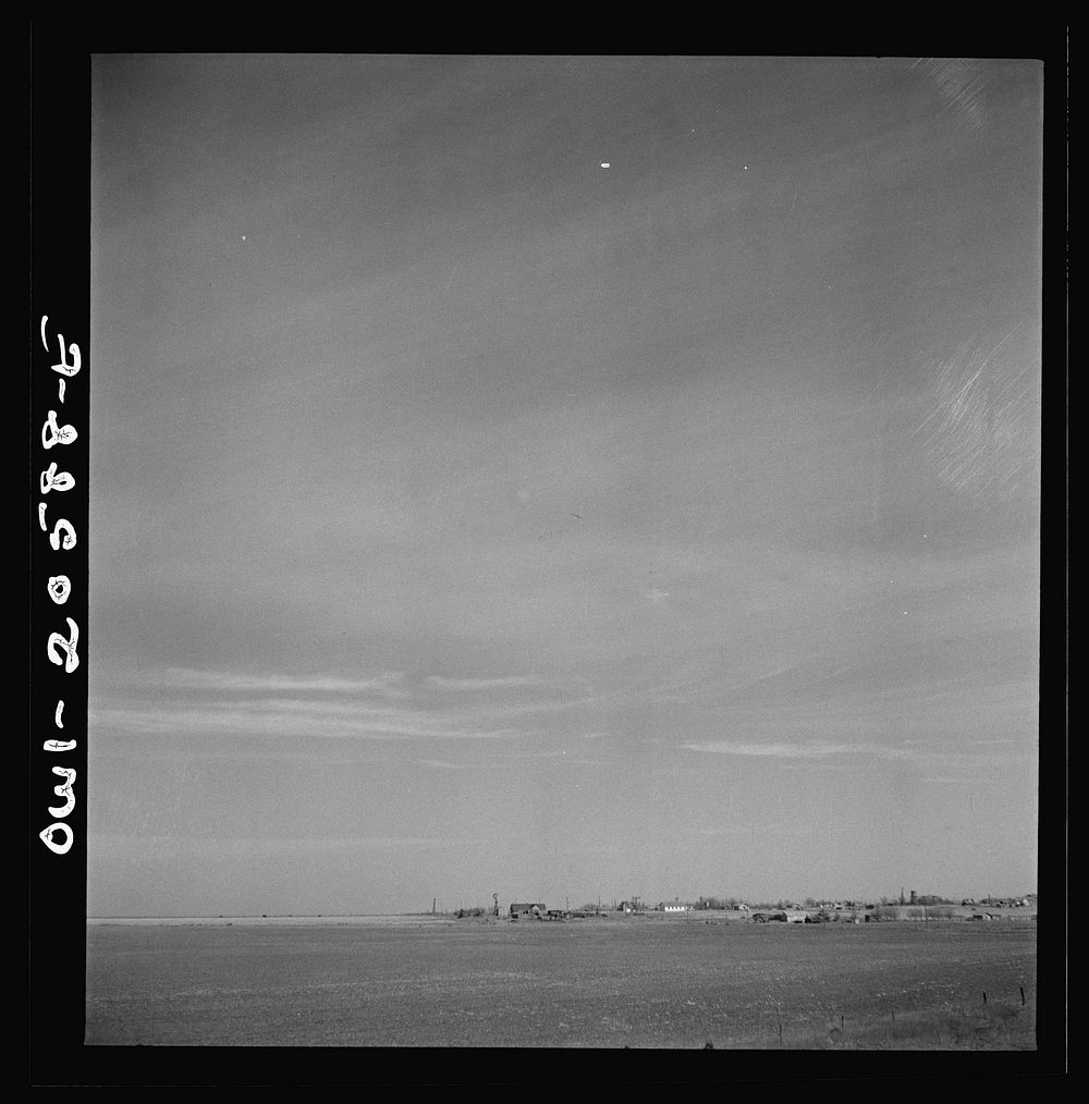 Friona, Texas. Going past the town on the Atchison, Topeka and Santa Fe Railroad between Amarillo, Texas and Clovis, New…