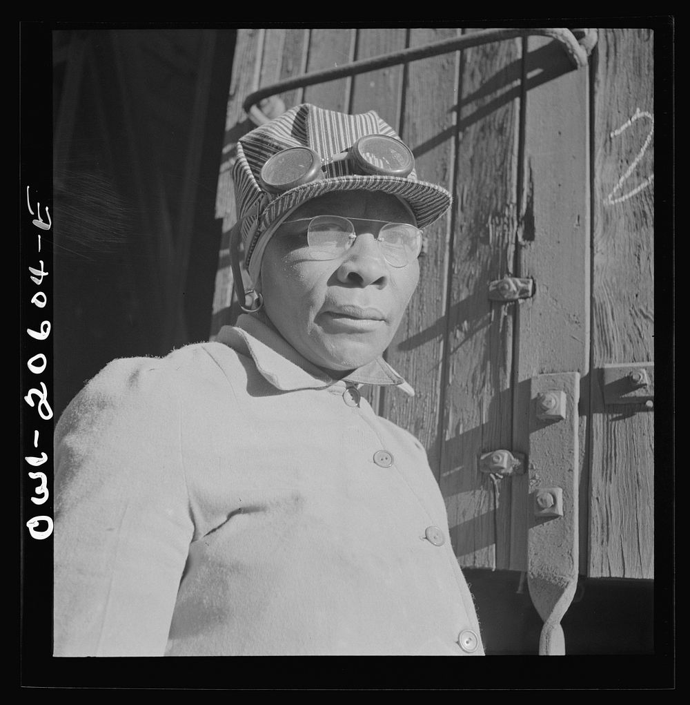 Clovis, New Mexico. Abbie Caldwell, employed in the Atchison, Topeka and Santa Fe Railroad yard to clean out potash cars.…