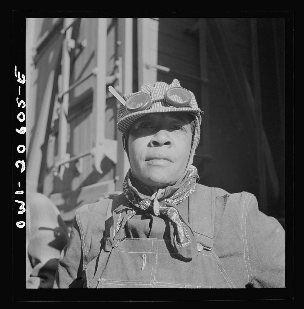 Clovis, New Mexico. Abbie Caldwell, employed in the Atchison, Topeka and Santa Fe Railroad yard to clean out potash cars.…