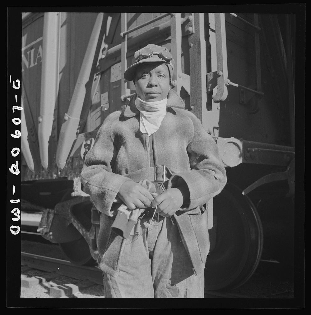 Clovis, New Mexico. Abbie Caldwell, employed in the Atchison, Topeka and Santa Fe Railroad yard to clean potash cars.…