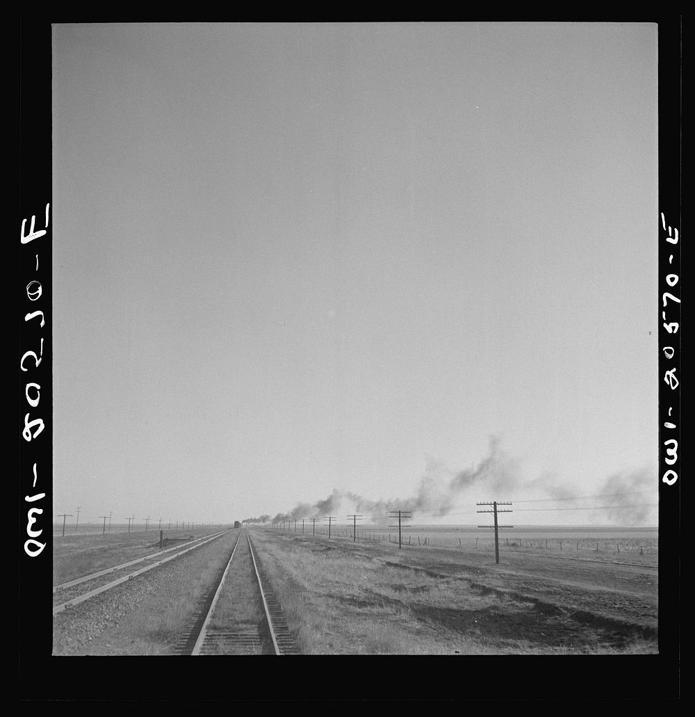 [Untitled photo, possibly related to: Dawn, Texas. Crossing Texas wheat country along the Atchison, Topeka, and Santa Fe…