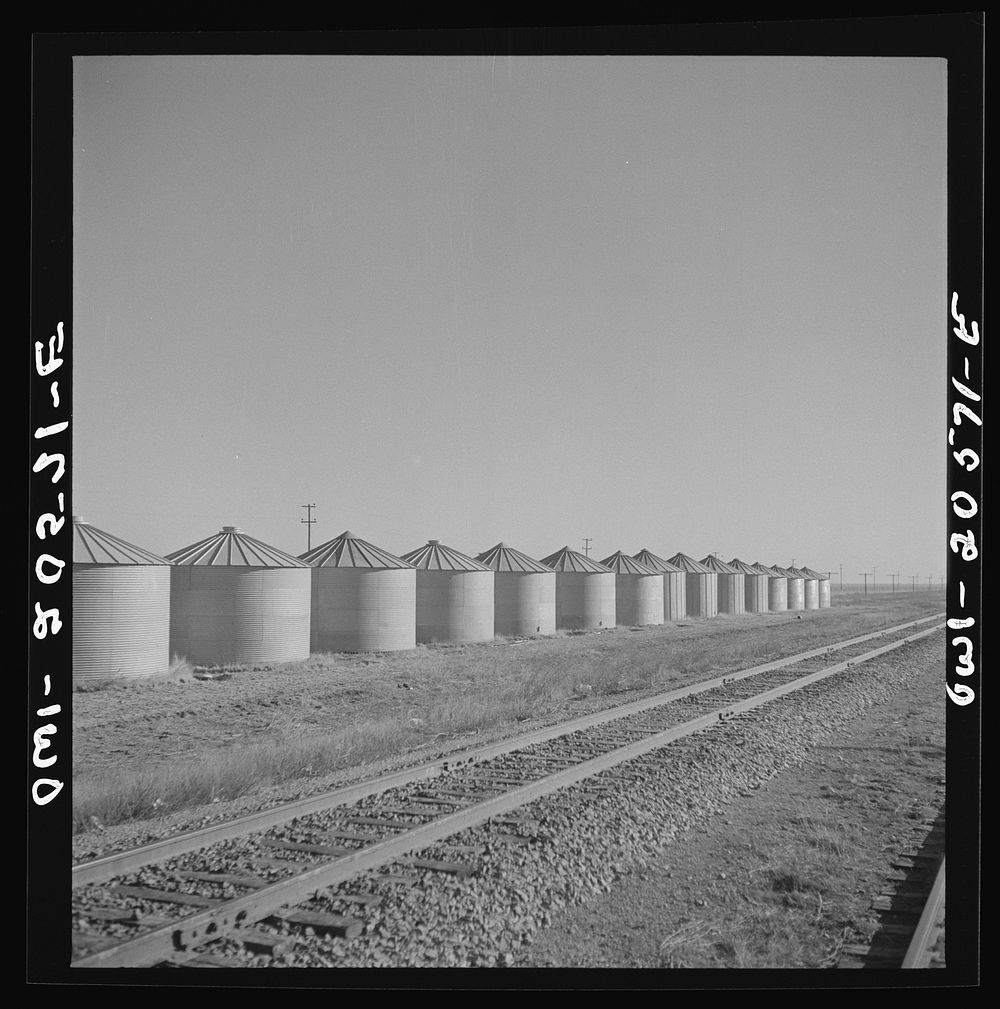 Dawn, Texas. Wheat storage bins along the Atchison, Topeka, and Santa Fe Railroad between Amarillo, Texas and Clovis, New…