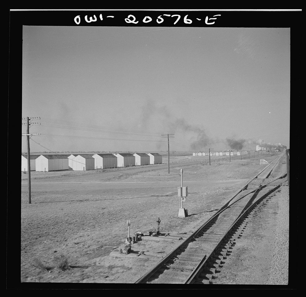 Hereford, Texas. Grain storage bins on the Atchison, Topeka, and Santa Fe Railroad between Amarillo, Texas and Clovis, New…