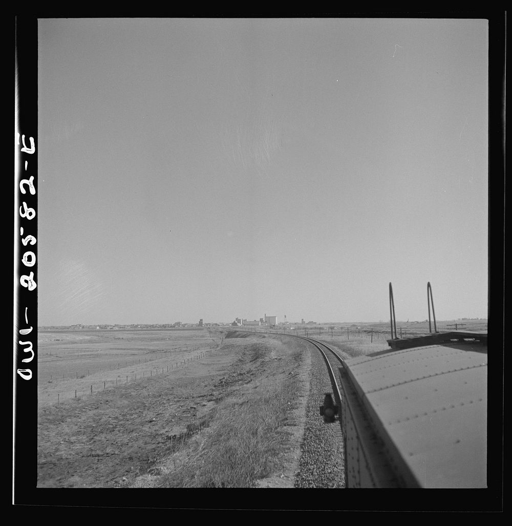 Hereford, Texas. Leaving the town on the Atchison, Topeka, and Santa Fe Railroad between Amarillo, Texas and Clovis, New…