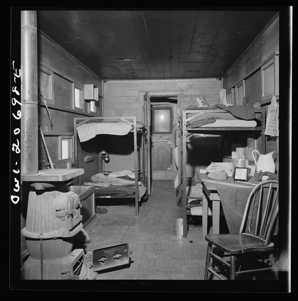 Iden, New Mexico. One of the bunk cars for section workers of a train on the Atchison, Topeka and Santa Fe Railroad between…