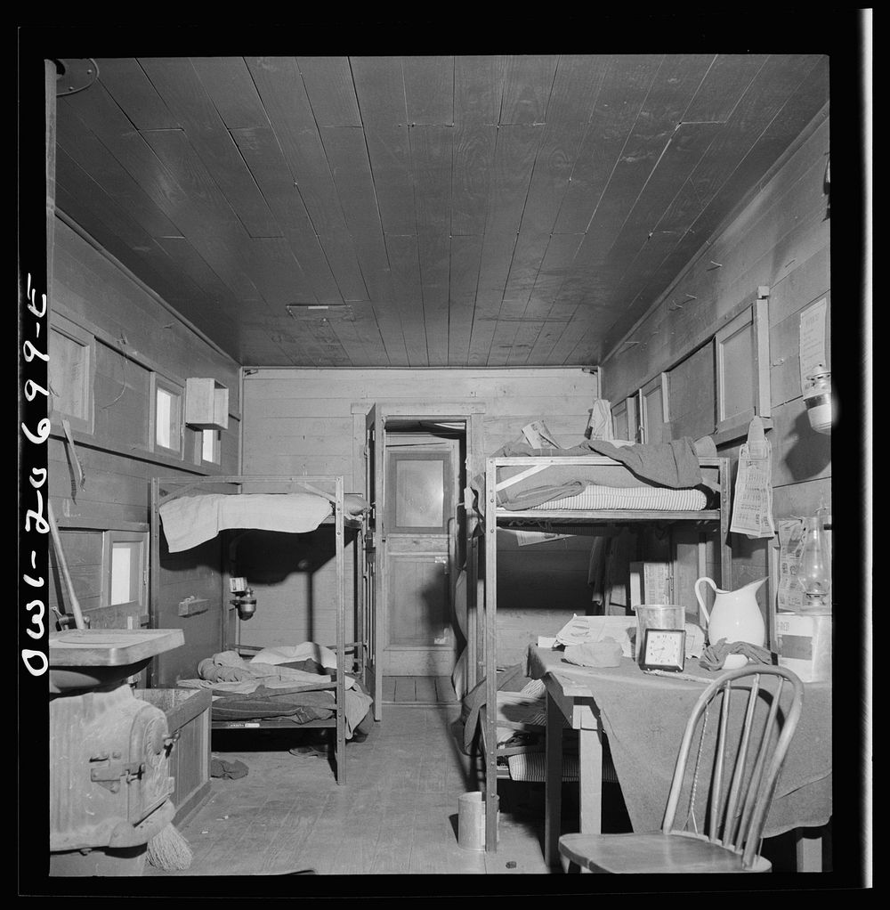 [Untitled photo, possibly related to: Iden, New Mexico. One of the bunk cars for section workers of a train on the Atchison…