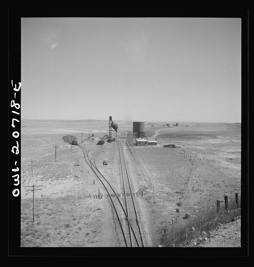 Vaughn, New Mexico. Passing the Southern Pacific Railroad station along the Atchison, Topeka and Santa Fe Railroad between…