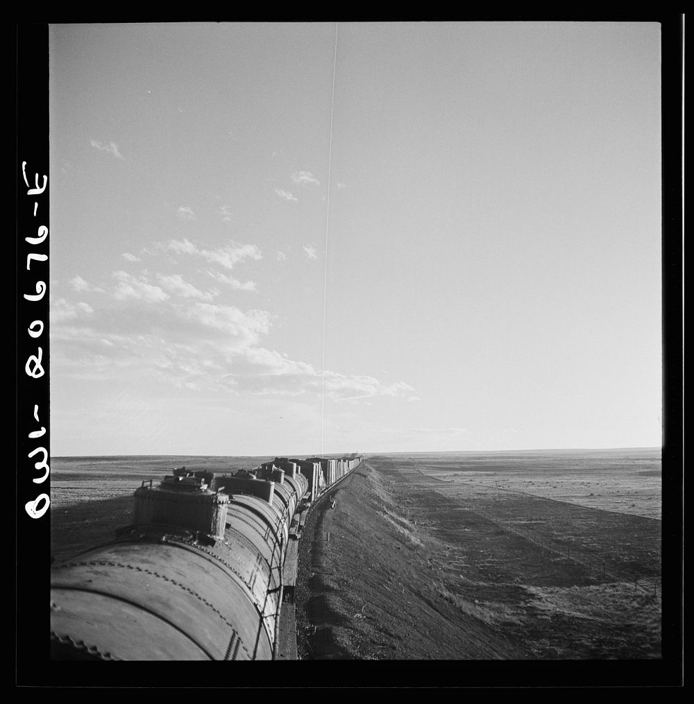 Duors, New Mexico. Going across sheep and cattle country along the Atchison, Topeka, and Santa Fe Railroad between Clovis…