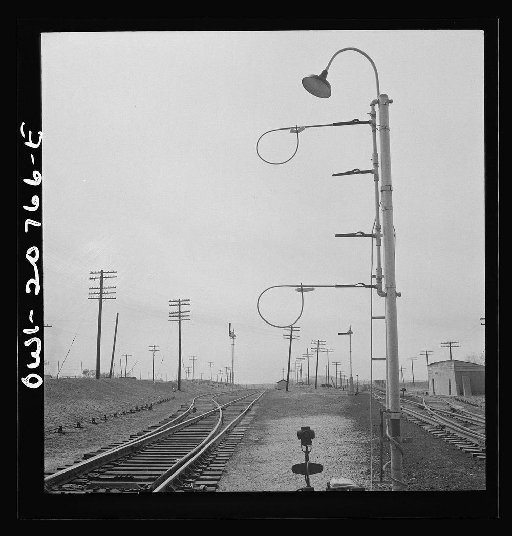 Isleta, New Mexico. Hoops with messages in place to be picked up by passing train on the Atchison, Topeka and Santa Fe…