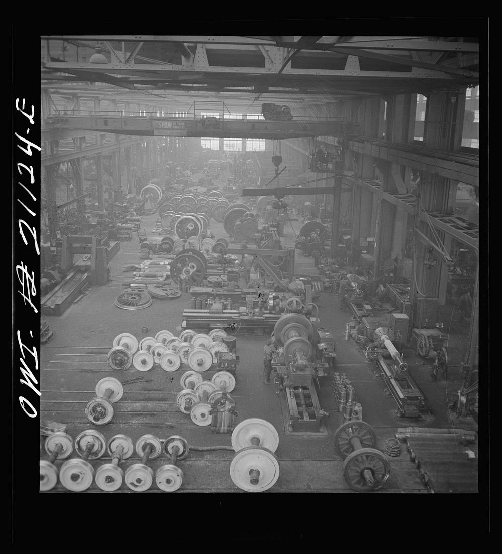 [Untitled photo, possibly related to: Albuquerque, New Mexico. In the wheel shop of the Atchison, Topeka and Santa Fe…