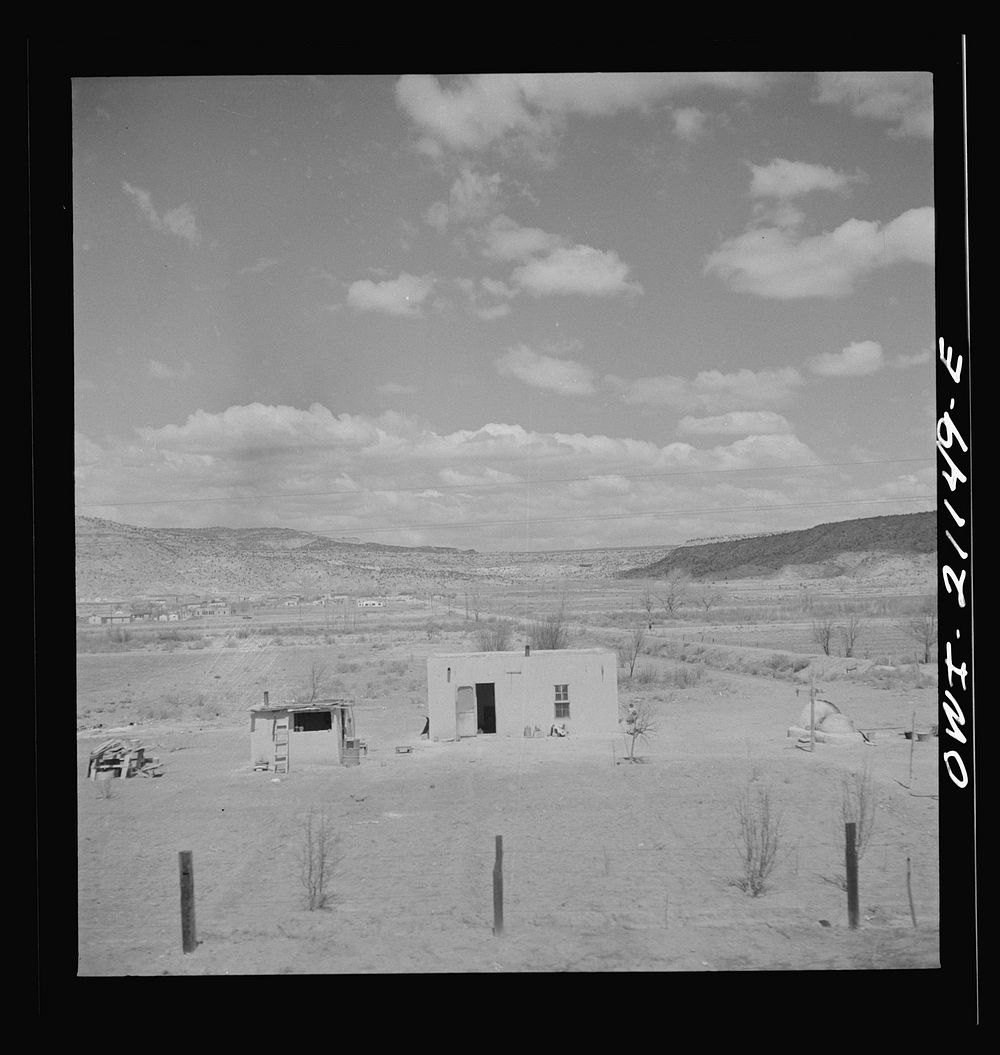 Laguna, New Mexico. An adobe house on the outskirts along the Atchison, Topeka and Santa Fe Railroad between Belen and…
