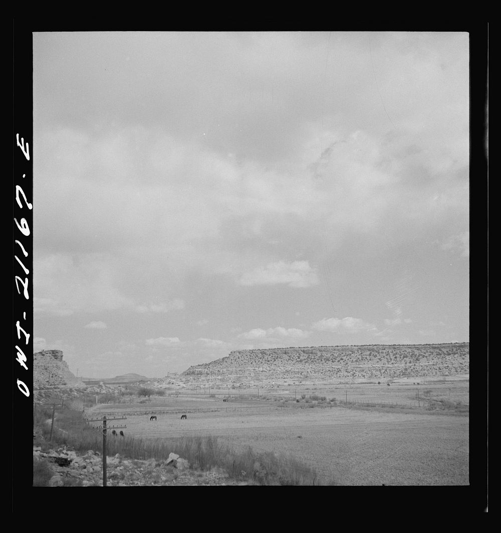 McCartys (vicinity), New Mexico. Passing by an Indian reservation along the Atchison, Topeka and Santa Fe Railroad between…