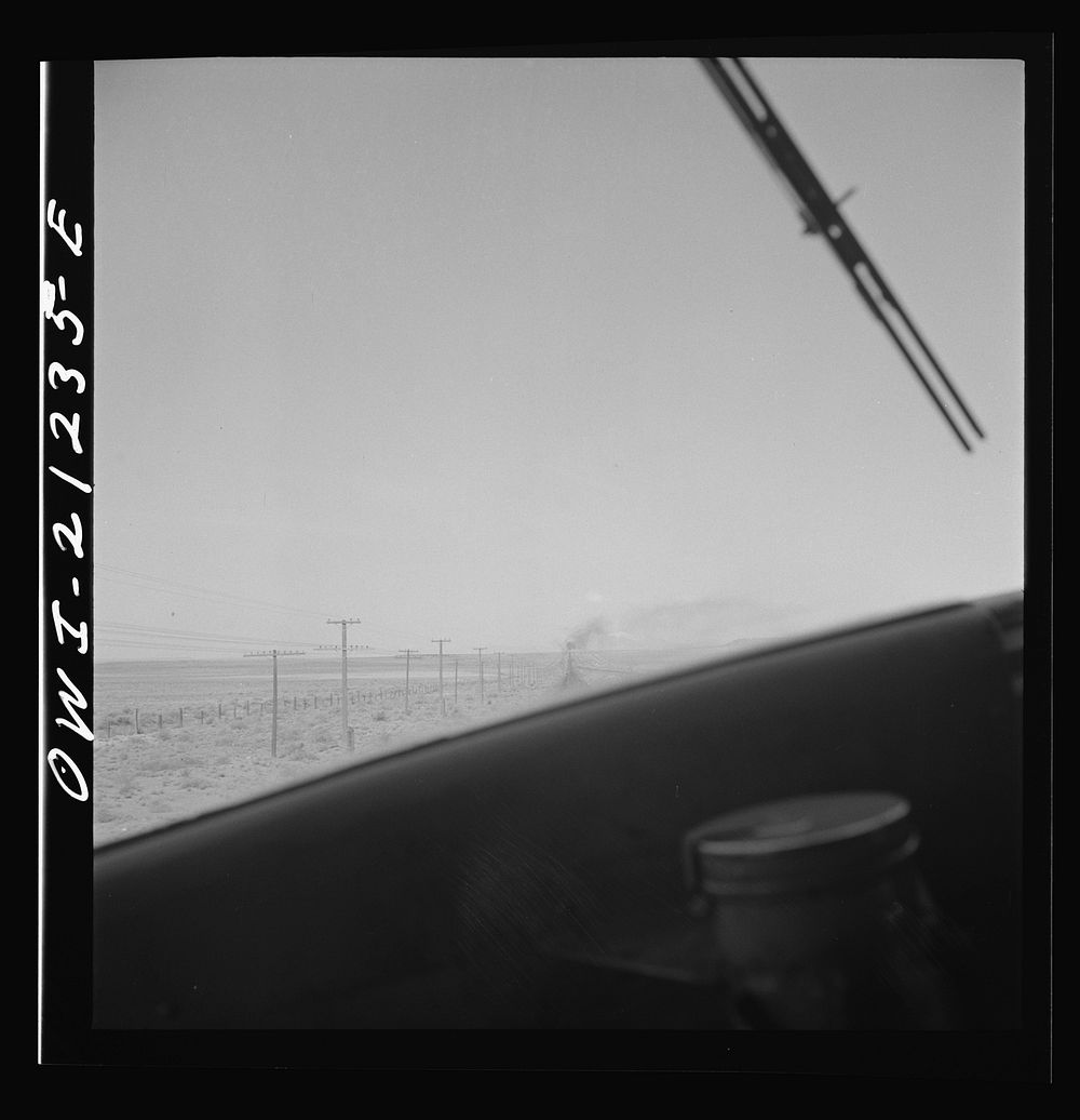 [Untitled photo, possibly related to: The diesel freight train along the Atchison, Topeka and Santa Fe Railroad between…