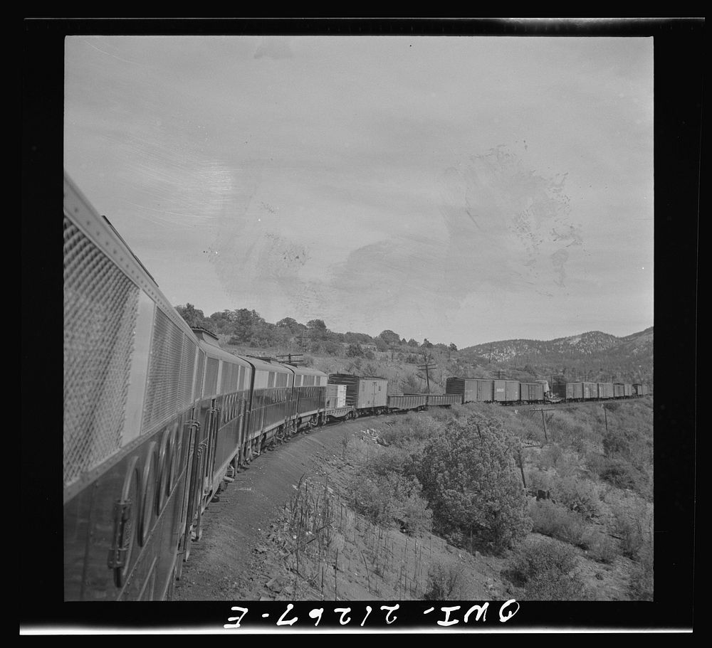 Williams, Arizona. A diesel freight train climbing through mountainous area along the Atchison, Topeka, and Santa Fe…