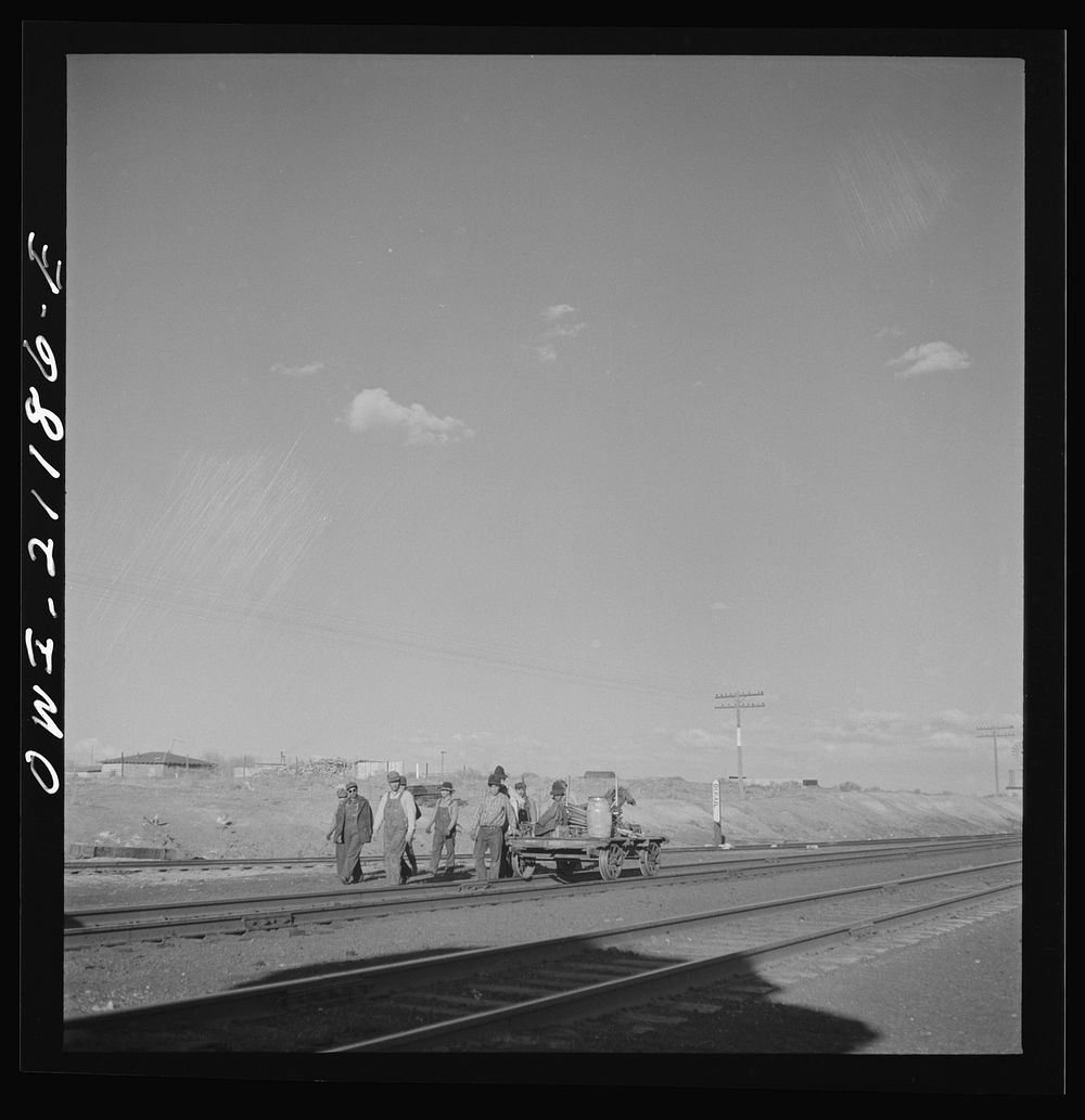 Thoreau, New Mexico. Section crew coming in after a day's work on the Atchison, Topeka and Santa Fe Railroad between Belen…