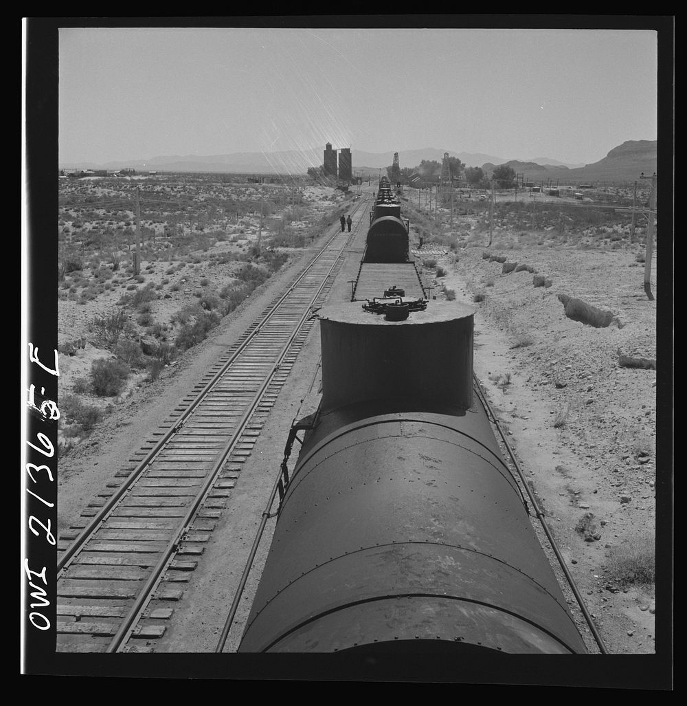 Yucca, Arizona. A local Atchison, Topeka and Santa Fe Railroad train stopping to set out a car. Sourced from the Library of…