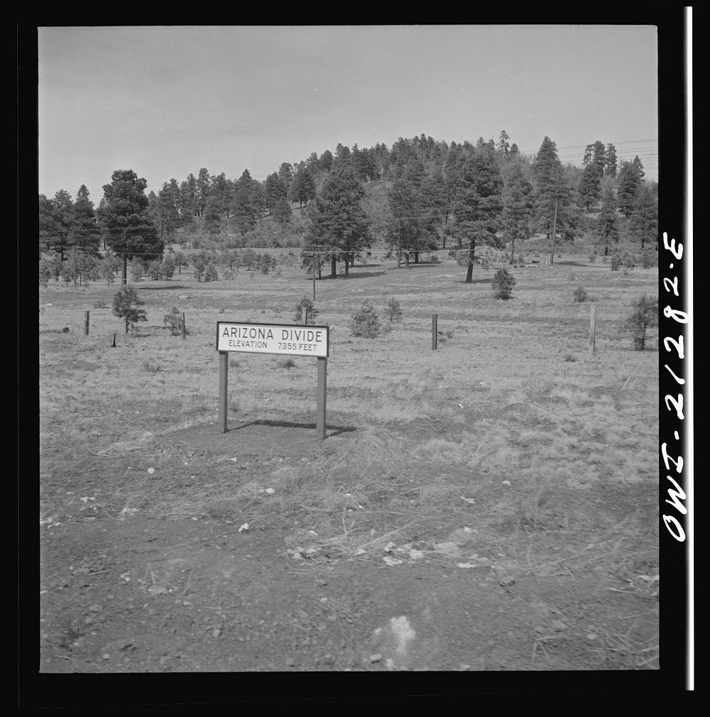 Williams (vicinity), Arizona. A sign marking the Arizona divide along the Atchison, Topeka and Santa Fe Railroad between…