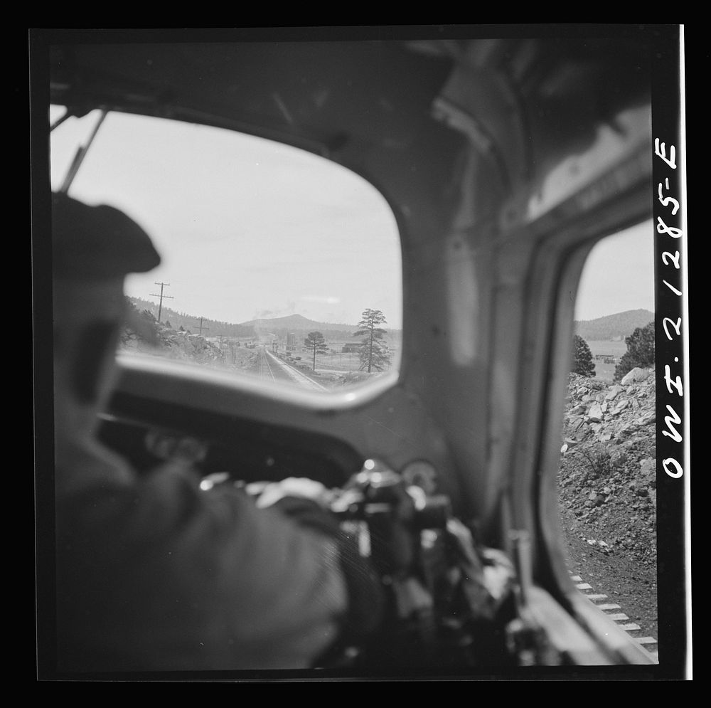[Untitled photo, possibly related to: Willliams, Arizona. The engineer, on the Atchison, Topeka and Santa Fe Railroad…