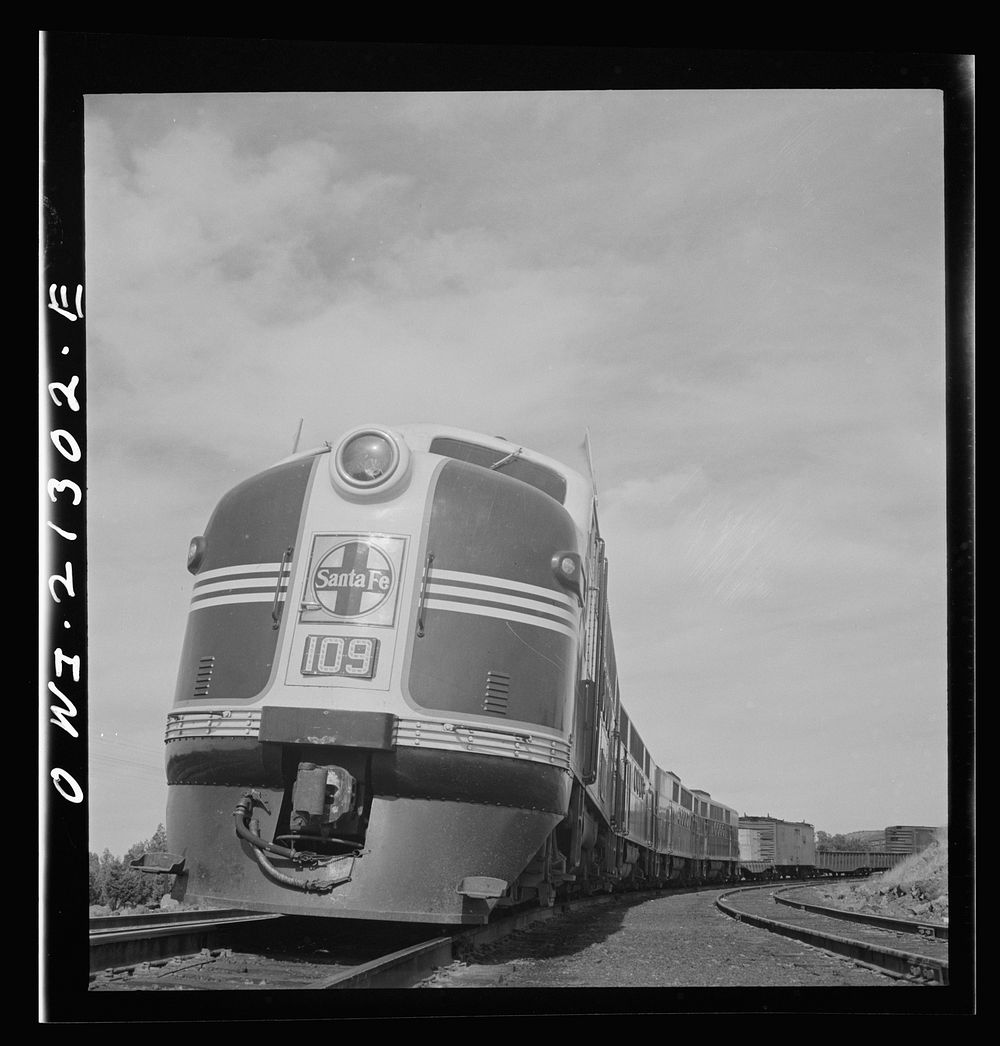 Ash Fork, Arizona. A diesel freight train on the Atchison, Topeka and Santa Fe Railroad between Winslow and Seligman…